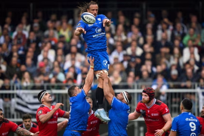 The Vannes lock Anton Bresler passes the ball from a lineout against Lyon
