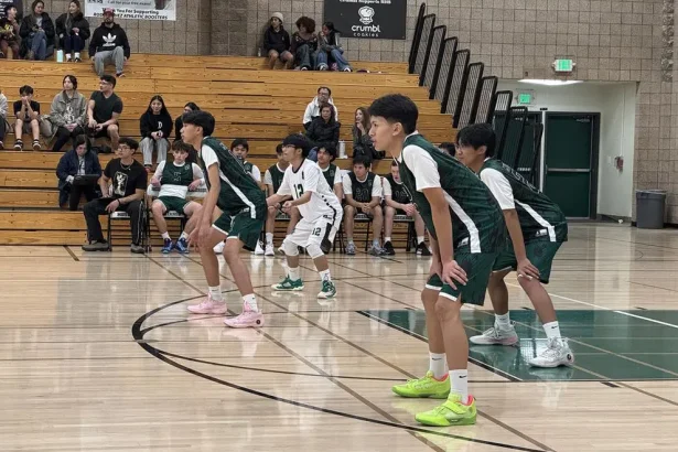 The Rodriguez High School boys volleyball team sets up its defense and prepares for a serve from Vanden during a Monticello Empire League match